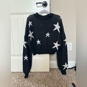 This is a brand new sweater! Never worn! Super cute and comfortable!